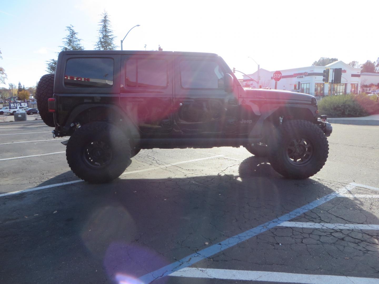 2018 BLACK /BLACK Jeep Wrangler JL Unlimited Rubicon (1C4HJXFG0JW) with an 3.6L V6 DOHC 24V engine, automatic transmission, located at 2630 Grass Valley Highway, Auburn, CA, 95603, (530) 508-5100, 38.937893, -121.095482 - JL Rubicon sitting on Teralfex suspension, Falken fast adjust shocks, Method wheels, BFG KM3 tires, Smittybilt winch, Rigid Leds, window tint, RC Fender eliminators, DV8 rear bumper, Smittybilt HD hinge kit, and a terflex spare tire relocation. - Photo#3